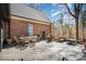 Spacious back deck with outdoor dining and seating, ideal for enjoying the backyard views and entertaining guests at 25 Blenheim Ne Ct, Concord, NC 28025