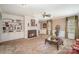 Inviting living room boasts a fireplace, built-in shelving, and warm, neutral tones at 25 Blenheim Ne Ct, Concord, NC 28025