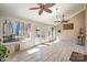 Bright sunroom with tile flooring and access to a deck at 25 Blenheim Ne Ct, Concord, NC 28025