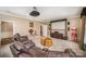 Home theater room with projector, screen, leather reclining seating, and vintage popcorn machine at 25 Blenheim Ne Ct, Concord, NC 28025
