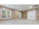Spacious basement with neutral walls, bright lighting, window, tile floor, and ample closet space at 2846 Snead Ne Ct, Conover, NC 28613
