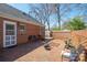 Private brick patio with outdoor seating and access to the back door at 311 S Cedar St # C, Lincolnton, NC 28092