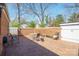 Brick patio with outdoor seating surrounded by a wooden and brick fence at 311 S Cedar St # C, Lincolnton, NC 28092