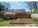 Large backyard with garden plots and a detached structure at 311 S Cedar St # C, Lincolnton, NC 28092