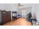 Comfortable bedroom features a ceiling fan, window, and wood-framed bunk bed at 311 S Cedar St # C, Lincolnton, NC 28092