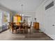 Formal dining room with hardwood floors, traditional decor, and a view into the kitchen at 329 N Ellis St, Salisbury, NC 28144