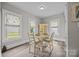 Cozy dining area with natural light, hardwood floors, and stylish decor at 329 N Ellis St, Salisbury, NC 28144