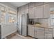 Spacious kitchen showcasing stainless steel appliances, granite countertops, and custom cabinetry at 329 N Ellis St, Salisbury, NC 28144