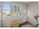 Bright sunroom featuring natural light, hardwood floors, and views of the outdoors at 329 N Ellis St, Salisbury, NC 28144