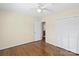 Cozy bedroom featuring hardwood floors and spacious closet storage at 343 Wakefield Dr # B, Charlotte, NC 28209