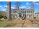 Charming two-story home with a brick facade, black shutters, and well-manicured landscaping at 343 Wakefield Dr # B, Charlotte, NC 28209