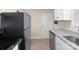 Practical kitchen space equipped with modern appliances and light-colored countertops at 343 Wakefield Dr # B, Charlotte, NC 28209