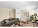 Bright living room featuring hardwood floors, neutral walls, built-in shelving and modern decor at 343 Wakefield Dr # B, Charlotte, NC 28209