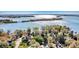 Stunning aerial view of waterfront property on Lake Norman with direct water access and surrounding greenery at 4221 Lake Shore S Rd, Denver, NC 28037