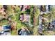 Bird's eye view of a home featuring a sprawling lawn, long driveway, and mature trees at 4221 Lake Shore S Rd, Denver, NC 28037