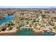 Beautiful aerial view of a lakeside property with a private dock and lush green surroundings at 4221 Lake Shore S Rd, Denver, NC 28037