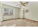 A bonus room with large windows and carpet is perfect for relaxing or entertaining at 4221 Lake Shore S Rd, Denver, NC 28037