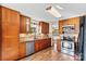Kitchen featuring stainless steel stove and dishwasher, mosaic backsplash, and tile floors at 4221 Lake Shore S Rd, Denver, NC 28037