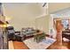 Bright living room featuring a fireplace, seating, and hardwood floors at 4221 Lake Shore S Rd, Denver, NC 28037