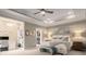 Spacious main bedroom with tray ceilings, sitting area, and ensuite bathroom access at 4225 Jasmin May Dr, Charlotte, NC 28226