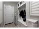 Functional mudroom featuring built-in storage, a bench, and convenient coat hooks at 4225 Jasmin May Dr, Charlotte, NC 28226