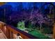 Backyard with a garden, lush greenery, and trees in a quiet and peaceful setting at 4232 Belle Meade Cir, Belmont, NC 28012