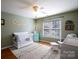 Charming Bedroom with crib, rocking chair, and decorative elements for a baby at 4232 Belle Meade Cir, Belmont, NC 28012