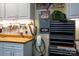 Well-organized garage with ample storage, workbench, and an EV charging station at 4232 Belle Meade Cir, Belmont, NC 28012