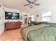 Bright and spacious bedroom with natural light, hardwood floors, and modern furnishings at 4522 Chuckwood Dr, Mint Hill, NC 28227