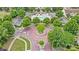 Aerial view of a community pool, surrounded by lush landscaping and mature trees at 4818 Grier Farm Ln, Charlotte, NC 28270