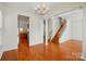Beautiful foyer with staircase and hardwood floors leads to a large living area at 4818 Grier Farm Ln, Charlotte, NC 28270