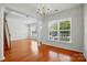 The spacious living room has wood floors and bright, natural light at 4818 Grier Farm Ln, Charlotte, NC 28270