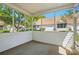 An outdoor patio with screened walls offering a view of the home's backyard at 4818 Grier Farm Ln, Charlotte, NC 28270