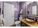 Stylish bathroom with unique sink, modern fixtures, and a calming purple color palette at 5030 Lily Pond Cir, Waxhaw, NC 28173