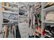 A walk-in closet with custom shelving and storage solutions to maximize organization at 5030 Lily Pond Cir, Waxhaw, NC 28173