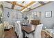 Elegant dining room featuring a large wooden table and decorative lighting at 5030 Lily Pond Cir, Waxhaw, NC 28173