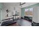 A home gym features a workout bench, free weights, a punching bag, and a large window at 5030 Lily Pond Cir, Waxhaw, NC 28173