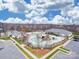 Aerial view of an amazing community water park featuring pools, slides, and ample parking for residents at 5030 Lily Pond Cir, Waxhaw, NC 28173