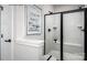 Sleek bathroom with frameless shower glass, tiled walls, modern fixtures, and decorative artwork at 5045 Grain Orchard Rd # 3027D, Indian Trail, NC 28079