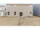 The backyard features a patio and a well maintained lawn at 5108 Puclerton Dr, Charlotte, NC 28215