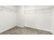 Walk-in closet provides ample storage space with wire shelving and carpeted flooring at 5108 Puclerton Dr, Charlotte, NC 28215