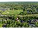 Aerial view of the home with lush surroundings and community amenities at 5811 Old Well House Rd, Charlotte, NC 28226