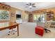 Spacious bonus room with desk, TV, windows, seating and carpet at 5811 Old Well House Rd, Charlotte, NC 28226