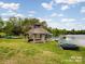 Gazebo next to a lake and boat ramp at 5811 Old Well House Rd, Charlotte, NC 28226