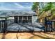 Spacious back deck for outdoor entertainment, complemented by a screened in porch at 6199 Timberlane Ter, Hickory, NC 28601