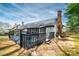 Exterior back view showcasing a large deck and screened porch at 6199 Timberlane Ter, Hickory, NC 28601