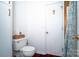 Bright bathroom with white walls, dark wood floors, and modern fixtures provide a clean and stylish space at 6199 Timberlane Ter, Hickory, NC 28601