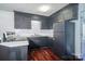 Well-lit kitchen with dark cabinets, white countertops, and subway tile backsplash at 6199 Timberlane Ter, Hickory, NC 28601
