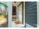 Home porch, featuring a blue wall, a white door, and a cute doormat by the entryway of the house at 6199 Timberlane Ter, Hickory, NC 28601