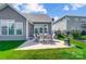 Backyard with patio, grill and outdoor seating, perfect for entertaining or relaxing outdoors at 6276 Artigas Dr, Fort Mill, SC 29707